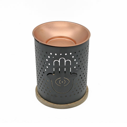 Decorative incense and oil burner for home, ritual, or spiritual practice.