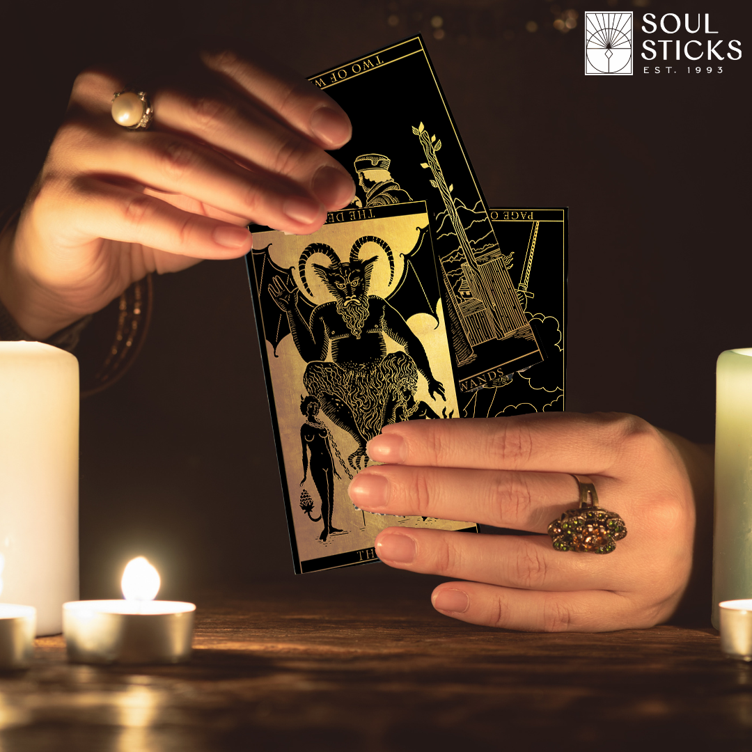 Set of spiritual cards with mystical artwork and messages.