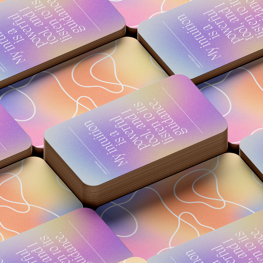 Set of spiritual cards with mystical artwork and messages.