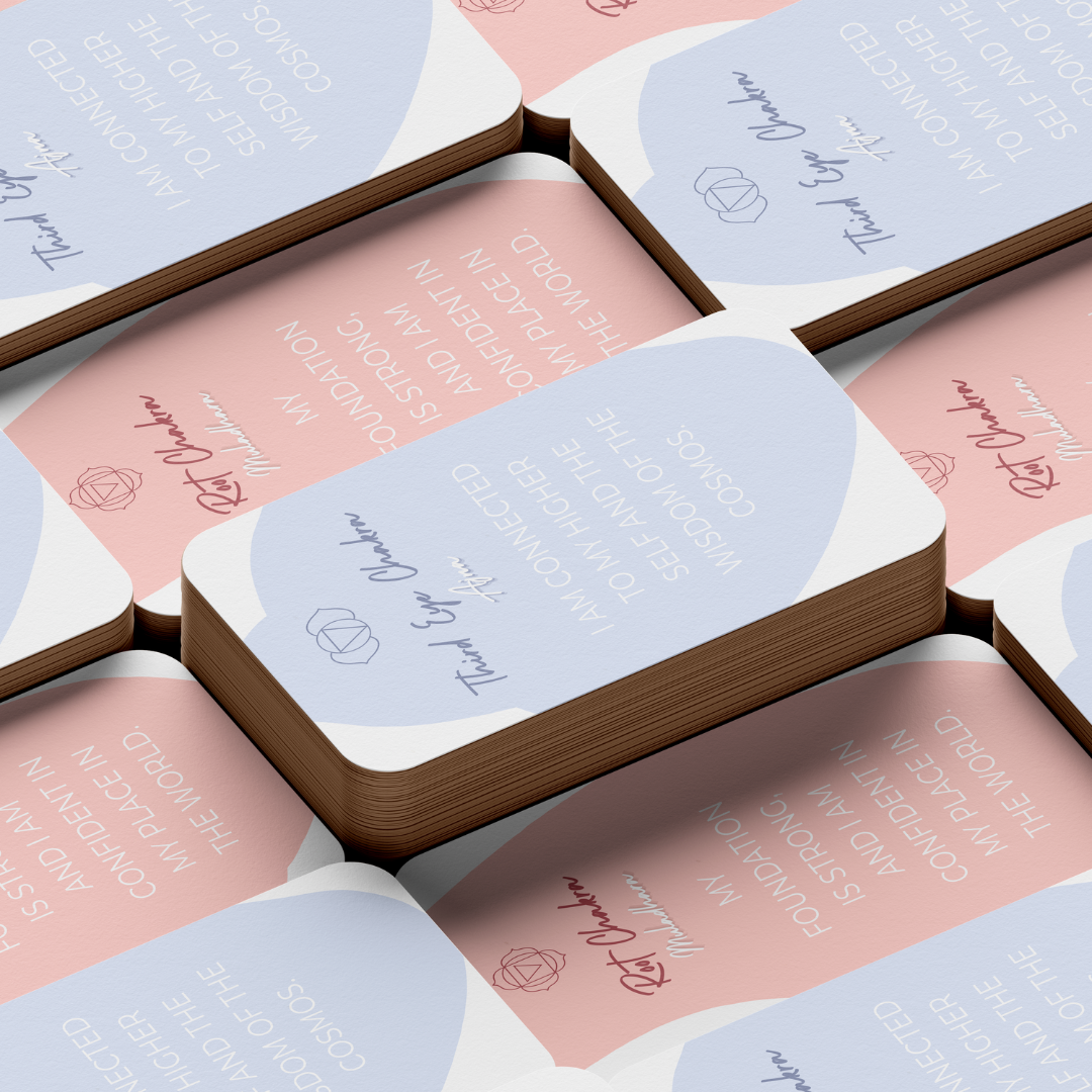 Set of spiritual cards with mystical artwork and messages.