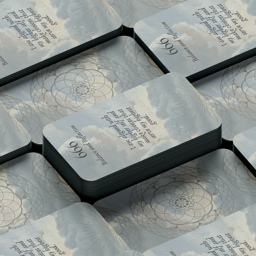 Set of spiritual cards with mystical artwork and messages.