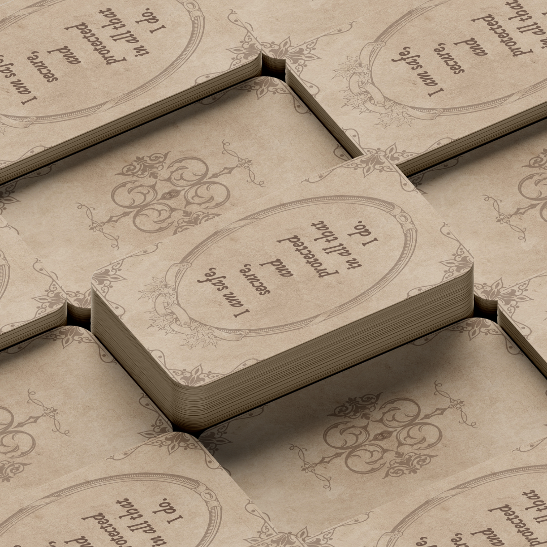 Set of spiritual cards with mystical artwork and messages.