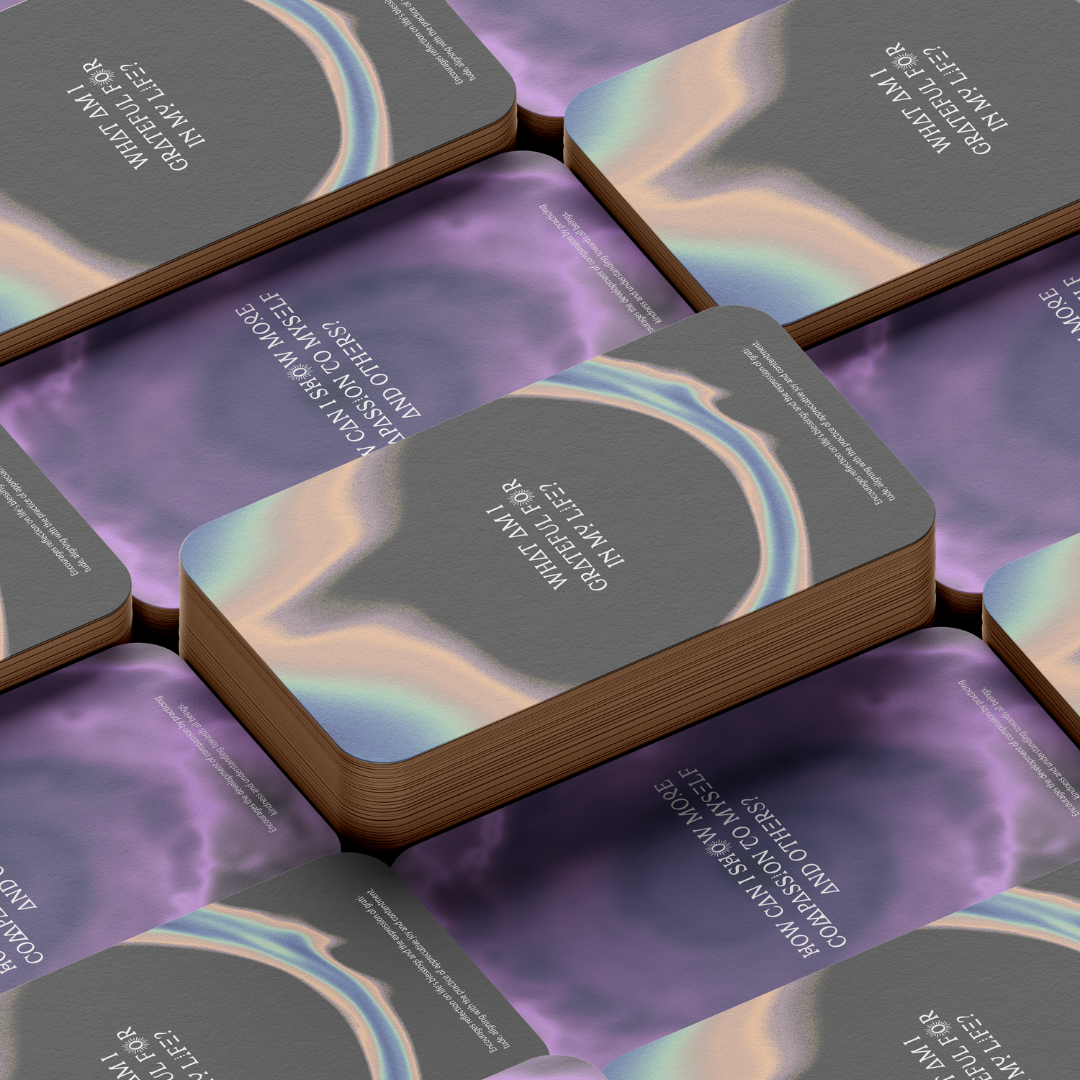 Set of spiritual cards with mystical artwork and messages.