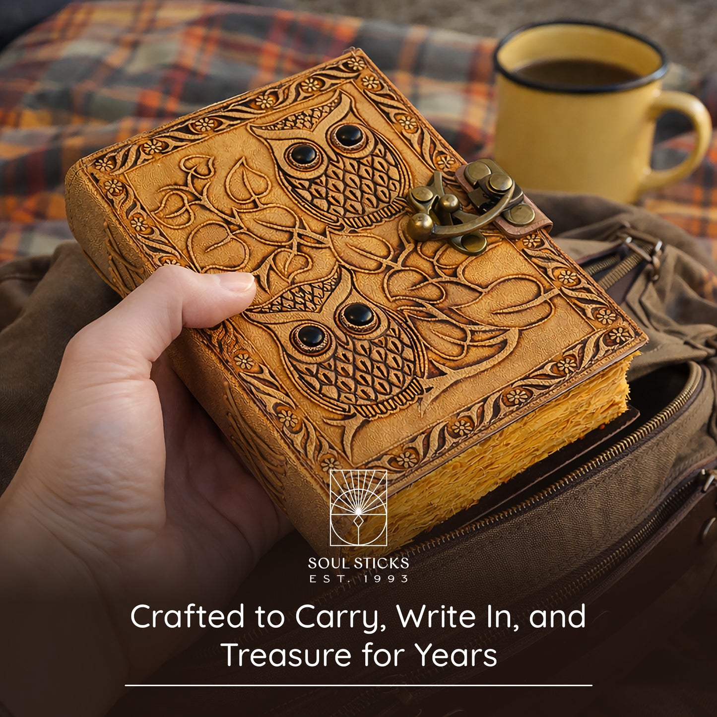 Angled view of the Owl leather journal in a lifestyle setting