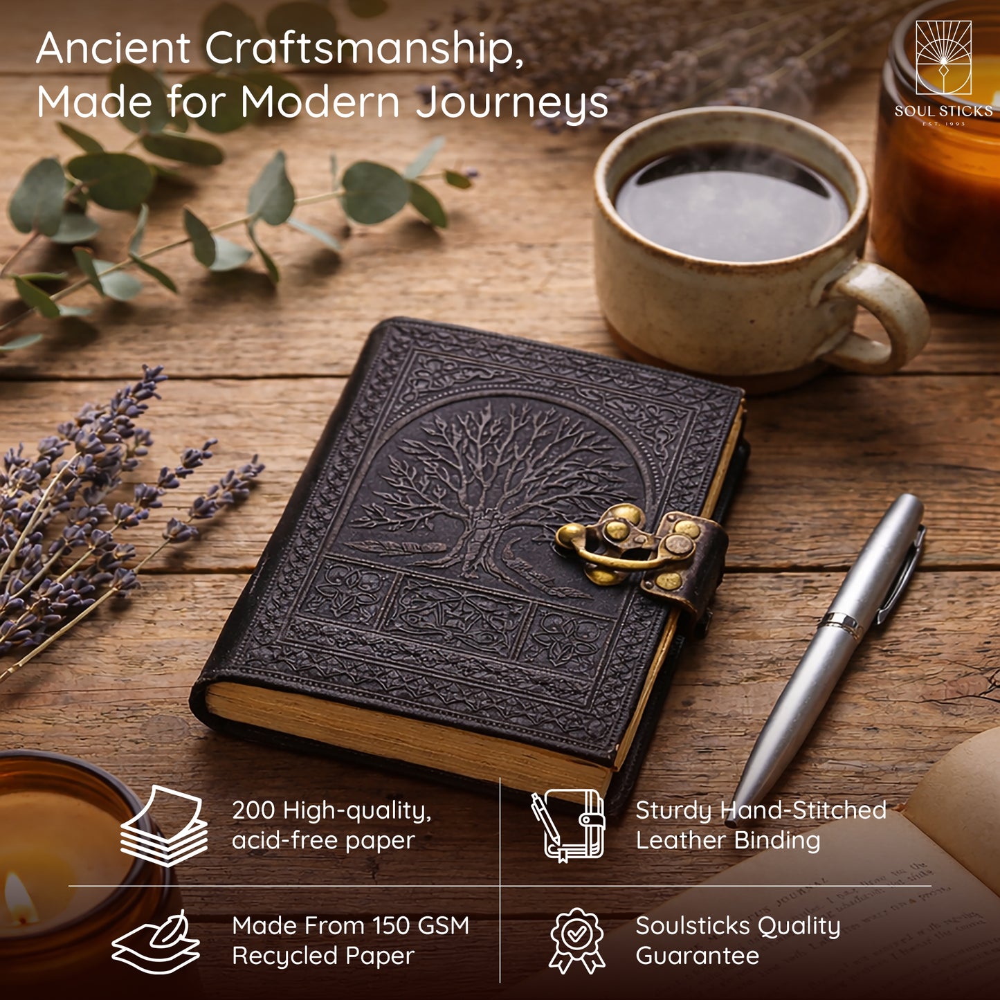 Closed Tree of Life leather journal resting on a fabric surface