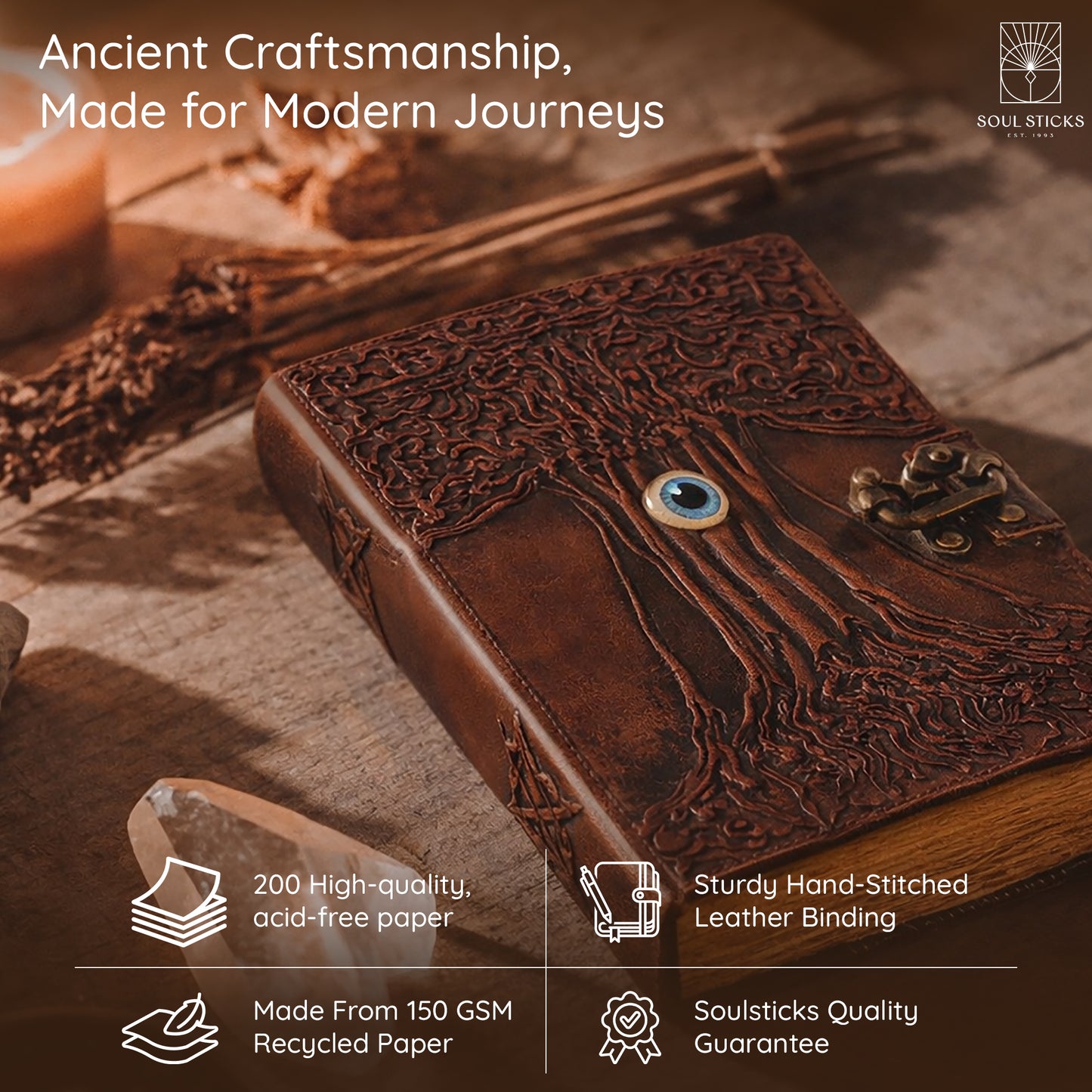 Closed Evil Eye Tree leather journal resting on a fabric surface