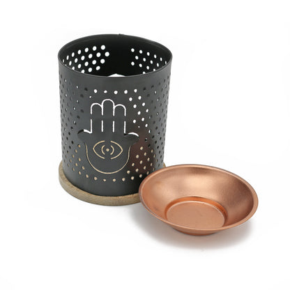 Decorative incense and oil burner for home, ritual, or spiritual practice.