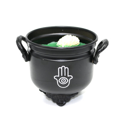 Mini cast iron cauldron designed for rituals, meditation, and energy cleansing.