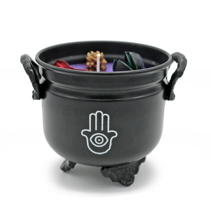 Mini cast iron cauldron designed for rituals, meditation, and energy cleansing.