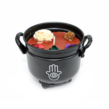 Mini cast iron cauldron designed for rituals, meditation, and energy cleansing.