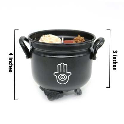 Mini cast iron cauldron designed for rituals, meditation, and energy cleansing.