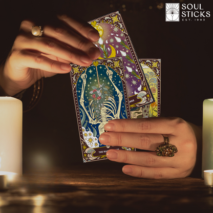 Set of spiritual cards with mystical artwork and messages.