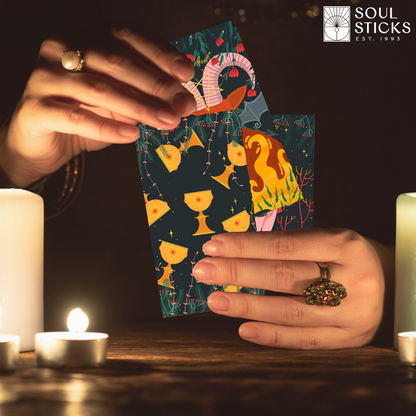 Set of spiritual cards with mystical artwork and messages.