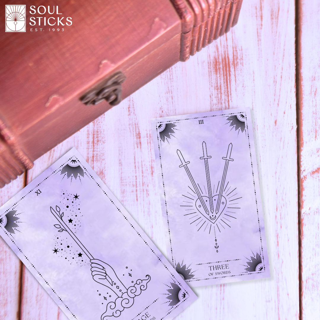 Set of spiritual cards with mystical artwork and messages.