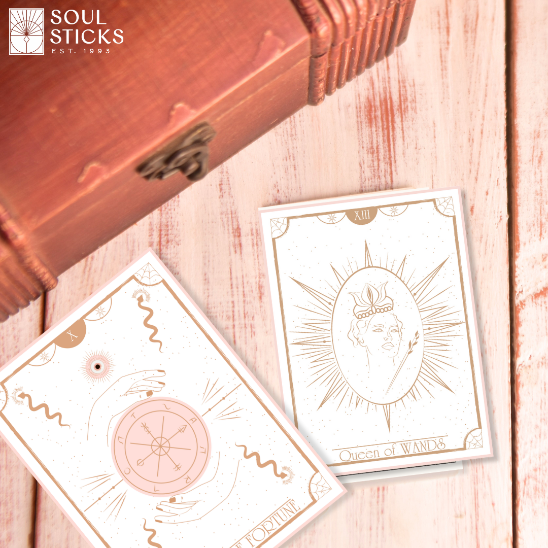 Set of spiritual cards with mystical artwork and messages.