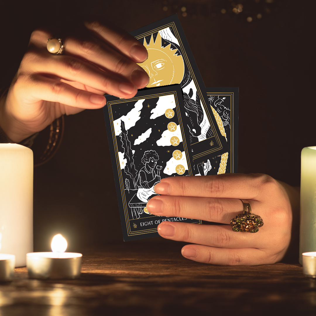 Set of spiritual cards with mystical artwork and messages.