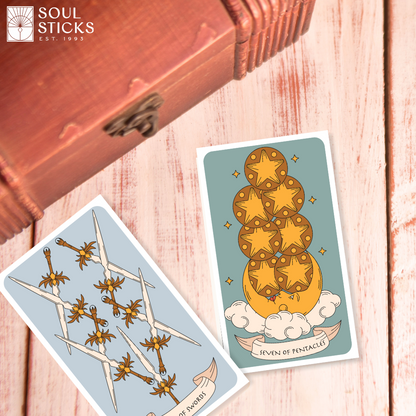 Set of spiritual cards with mystical artwork and messages.