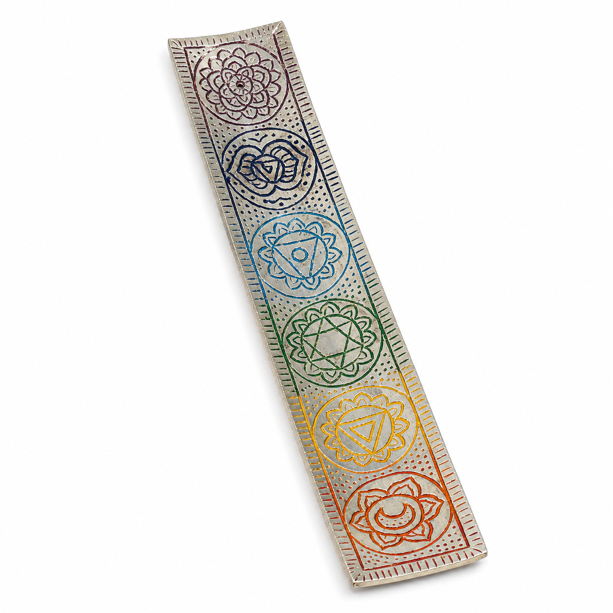 Silver-tone 7 chakra incense stick holder with engraved rainbow chakra symbols, raised decorative details, and a gently curved rectangular tray on a white background.