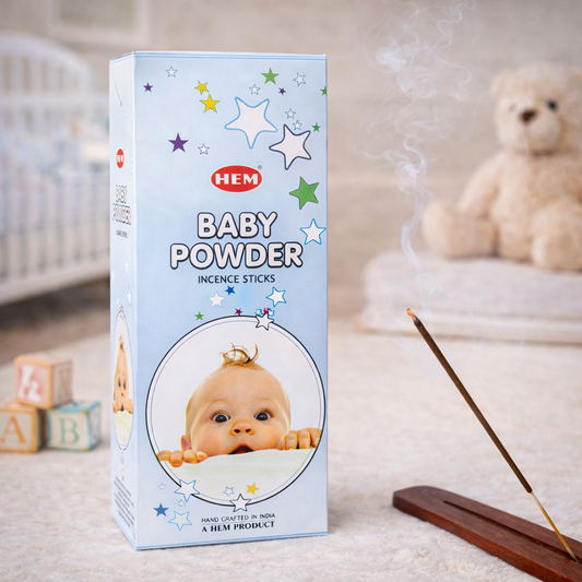 HEM Baby Powder incense sticks box with burning incense in a nursery setting
