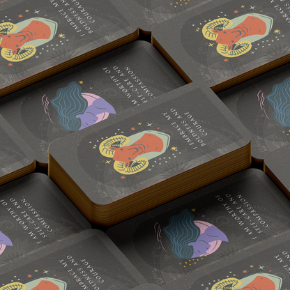 Set of spiritual cards with mystical artwork and messages.