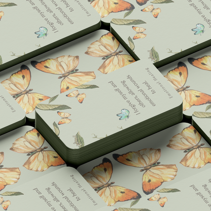 Set of spiritual cards with mystical artwork and messages.