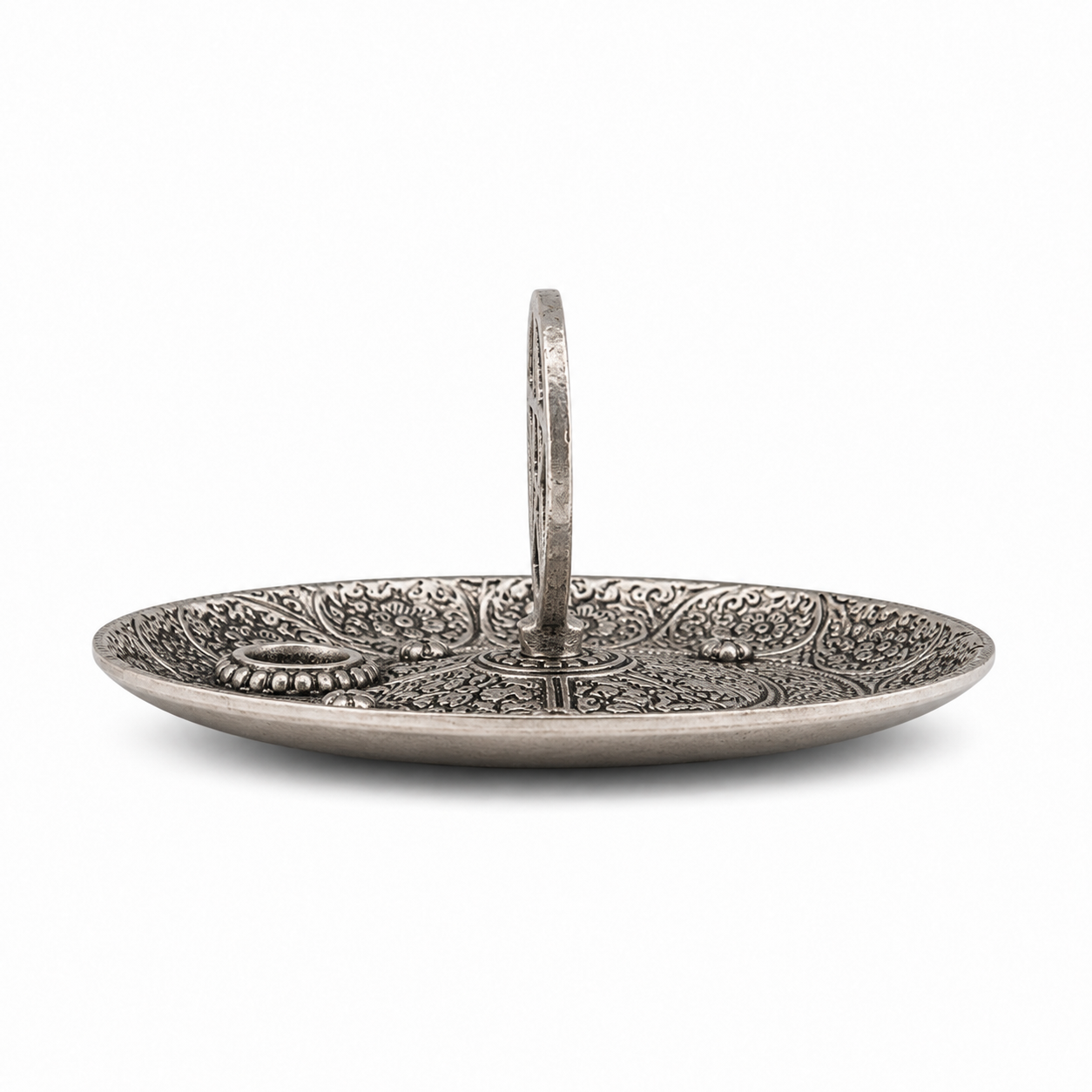 Antique silver pentagram incense holder shown from the side, featuring an ornate engraved round dish and upright pentacle centerpiece.