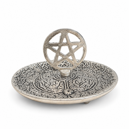 Ornate silver pentacle incense holder with engraved floral details on a clean white background.
