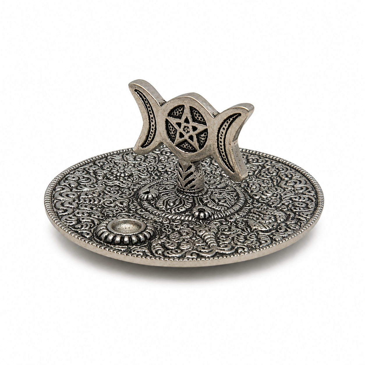 Antique silver Triple Moon pentacle incense holder with ornate floral detailing and raised stand on a white background.