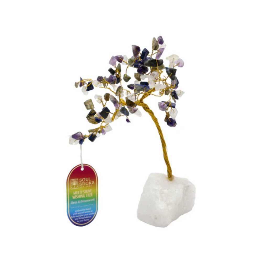 Decorative crystal tree with a tag on a white background