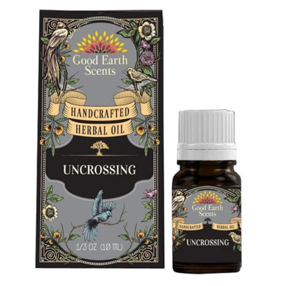 Herbal oil bottle and packaging on a white background