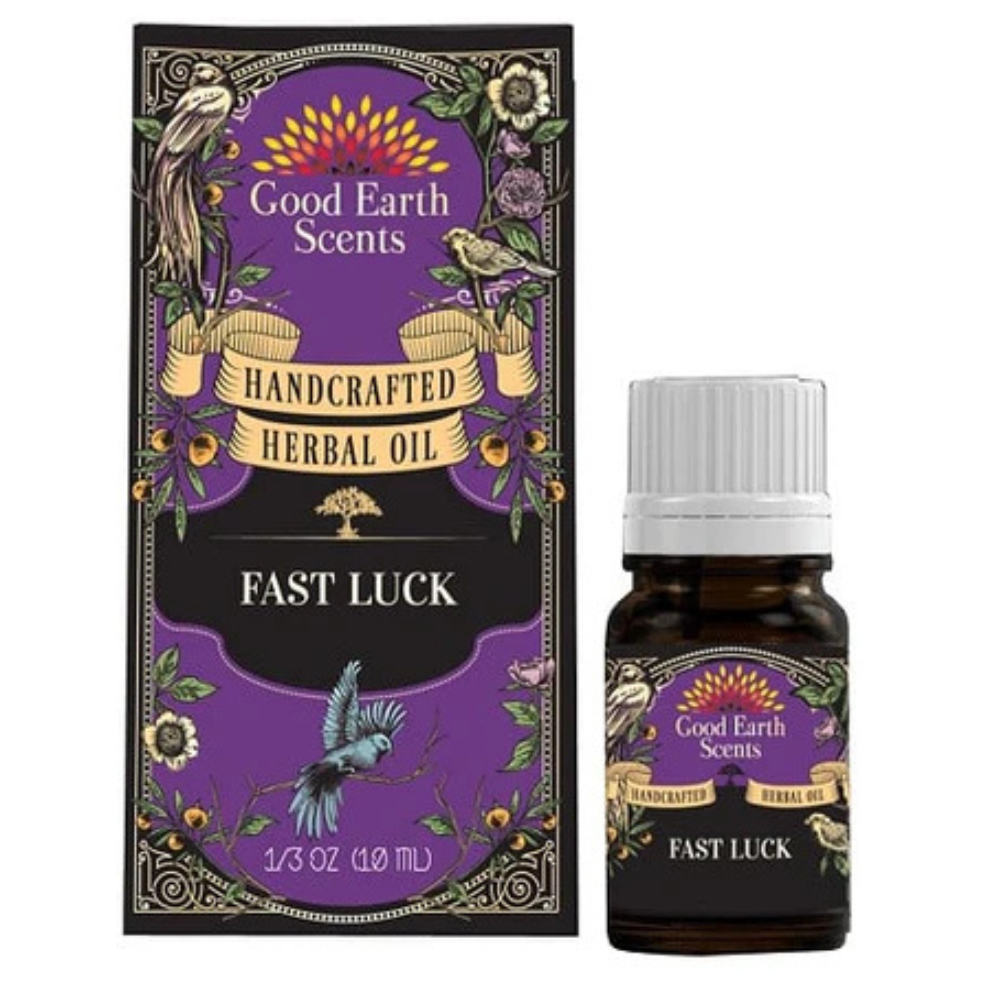 Herbal oil bottle and packaging on a white background