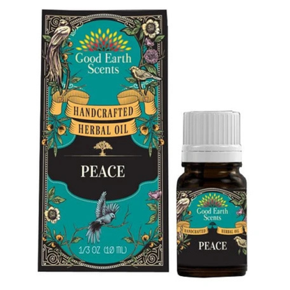 Herbal oil bottle and packaging on a white background