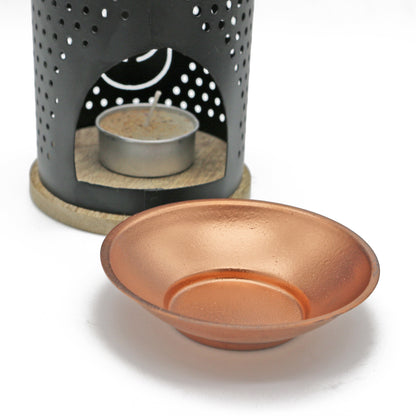 Decorative incense and oil burner for home, ritual, or spiritual practice.