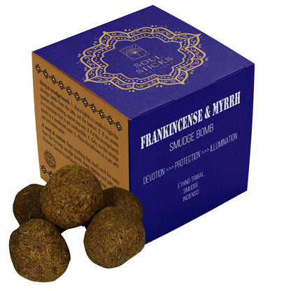 Box of Frankincense & Myrrh smudge bombs on a plain background