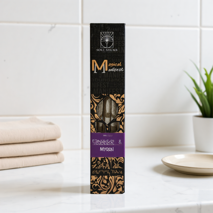 Magical Manifest Frankincense & Myrrh Incense on a bright white marble vanity with clean spa styling